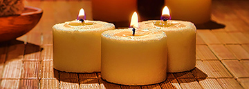 multiple clustered candles burning